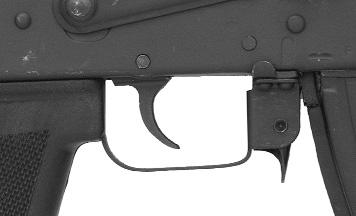 Illustration # 4 Illustration # 5 Operating handle Magazine release lever Press the magazine release lever forward to remove the magazine from the rifle.