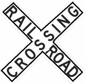 The black and white sign is referred to as a cross buck and is a warning that the driver is at the railroad crossing. Look, Listen and be prepared to stop.