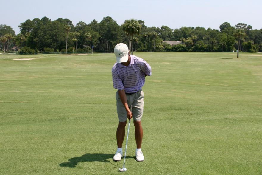 SHORT GAME ONE ARM SWING Practice some pitch shots with your left arm behind your back.