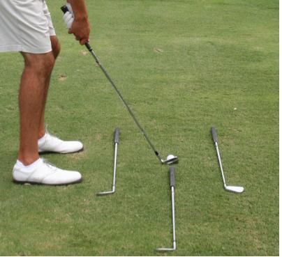 PHASES OF THE SWING ALIGNMENT When setting up make sure that you aim first with the face of your club. Then align your body square to the face.