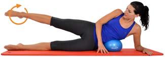 Lay on your side, placing the Mambo Max Soft- Over-Ball underneath your ribs.
