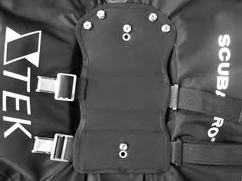 Place the soft backplate onto the bladder with the loops facing down and the Super cinch buckles on the left. 2. Place the bladder onto the back of the Form Harness.