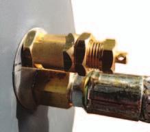 Tighten locking nut to valve using two 9/16 wrenches L Correct setting once locking nut is secure and locked down. 3.