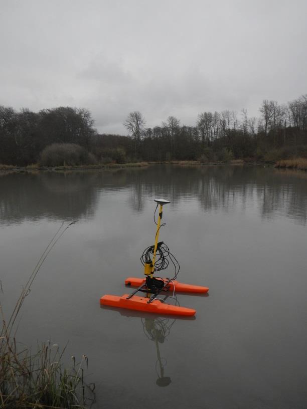 Figure 3. The Sonarmite shallow water survey system and ProMark 200 RTK-DGPS system mounted to a cata-raft.