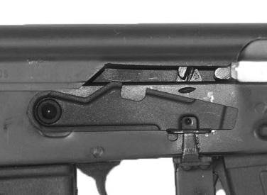 Gas tube 10. Barrel 11. Front sight 12. Compensator 13. Cleaning rod attachment 14. Lower handguard 15. Magazine 16. Magazine release lever 17. Trigger 18.