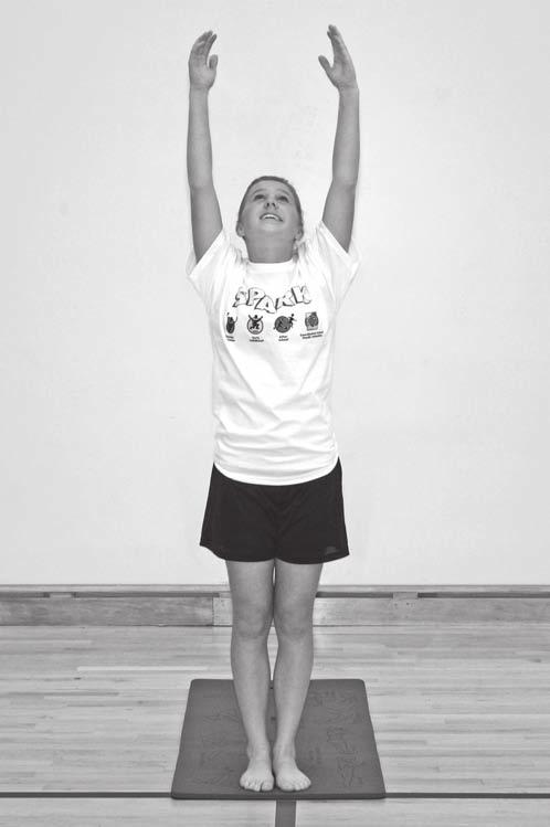 Sun Salutation Pose #2 Mountain Pose 2 Press palms together and raise hands up above head.