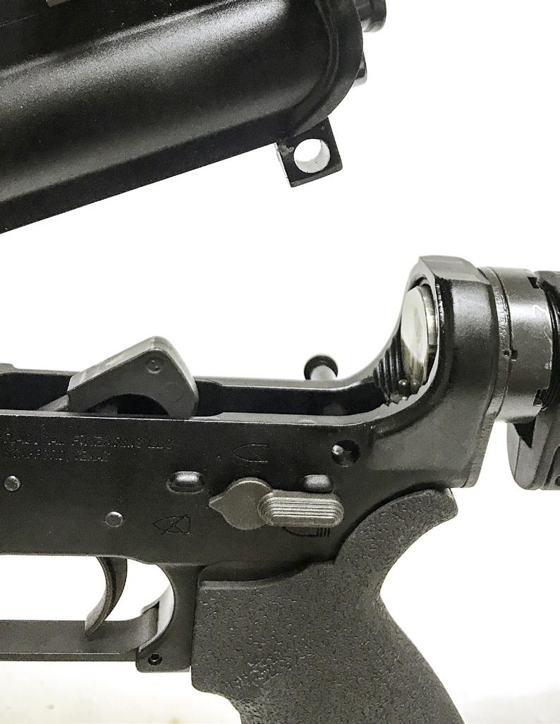 3. Pivot the lower receiver down and away from the upper receiver. 4.