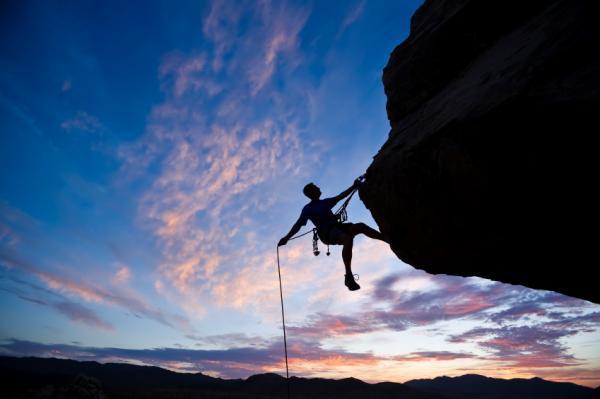 A rock climber wears a 7.5 kg backpack while scaling a cliff. After 30. minutes, the climber is 8.2 m above the starting point.