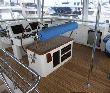 Access via turning staircase from Cockpit on Port side Pilot seat for 2 persons at Main Helm Stern sofa seating for 8 person with dining tables Wrap around pantry 4 large under seat waterproof
