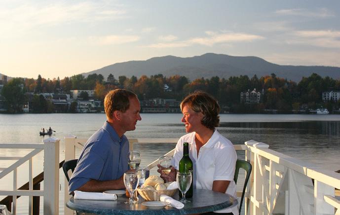 Boat House Summer Deck Dining A perfect Adirondack evening begins at the Lake Placid Club Boat House on the pristine shores of Mirror Lake.