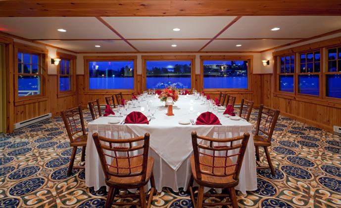 With its large covered deck extending over the lake, the Boat House affords a truly memorable vantage point with magnificent sunsets, making it a favorite dining