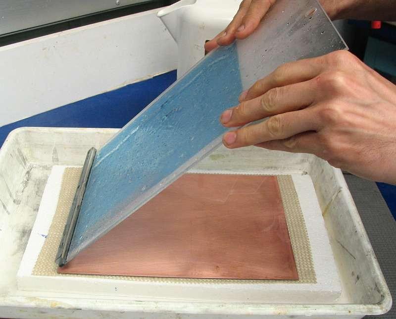Prepare for lamination Position the squeegee board with the photoresist facing the copper as shown in the photo.