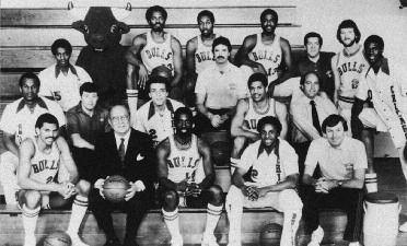 1981-1982 CHICAGO BULLS Left to right: (first row): Reggie Theus, Chairman of Executive Committee Arthur M. Wirtz, Ricky Sobers, Ronnie Lester, General Manager Rod Thorn.