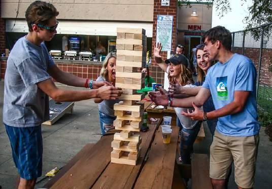 RESTROOMS, AND GAMES LIKE BAGS & GIANT JENGA!