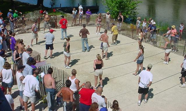 Human Foosball Rules All teams are 9 people. The foosball field will consist of 2 rows of 3 people each, 1 row of 2 people, plus a goalie for each team. The field of play is a 50' x 30' arena.