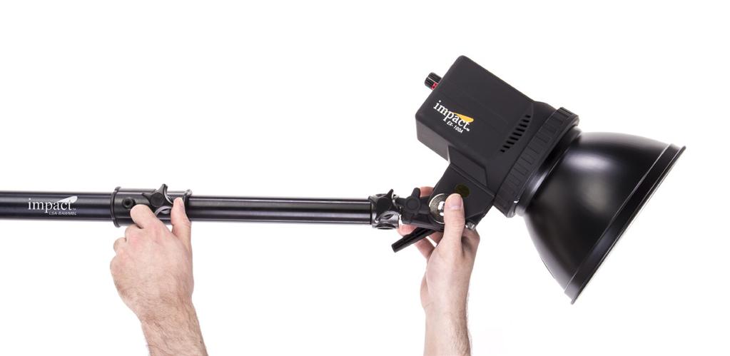 Operating the boom arm 3. To extend the boom arm, loosen the locking knob and pull the extension section of the arm out to the desired position.