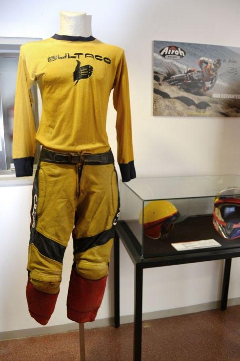 Suit worn by Narcis Casas (Enduro), consisting of helmet, jersey and trousers (1972). stamp their cards at a specific time; they are penalized if they arrive either early or late.