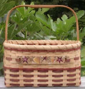 6 ½ high. The braided leather handles add character to this very useful basket.