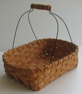 Approx 12 high Chocolate and Cinnamon Charlie Coleman $45 This basket is made on a double slotted base.