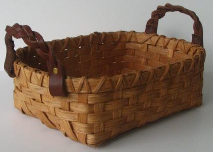It is make of dark brown and light brown Classy Buns Wanda Harris $30 This little basket is approximately 7 X 9 X 3