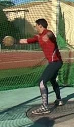 Weight is on the balls of the feet Discus is swung back and behind to vertical