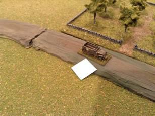 The German halftracks started to dismount their troopers at the assigned