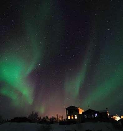 During the day guests enjoy a range of activities including ice fishing, snowmobiling, snowshoeing and touring the area. At night it s a light show under the Auroral Oval.
