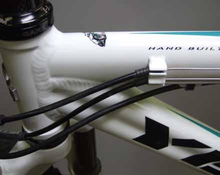 There are two cable stops on the side of the top tube, each with two positions to secure housing.