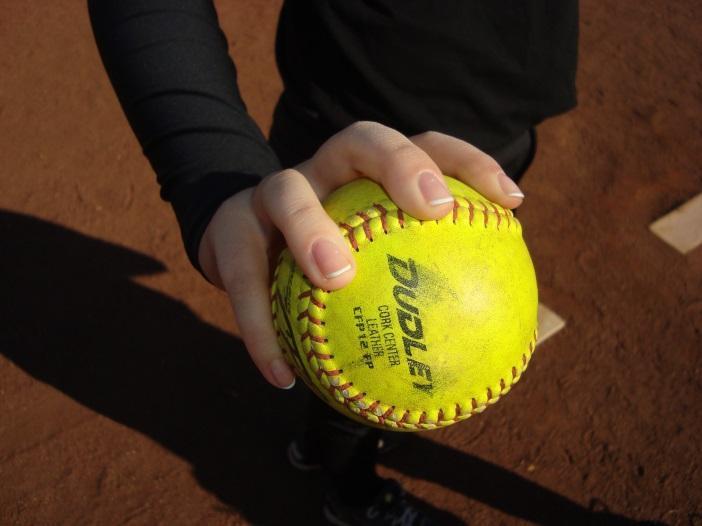 Pitching motion in 5 steps: 1. Both feet touching rubber, ball in hand in glove with proper grip 2.