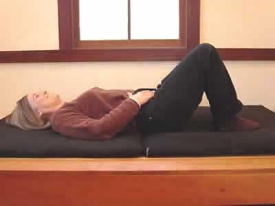 Here is an alternative to placing the cushion on the chest while lying down.