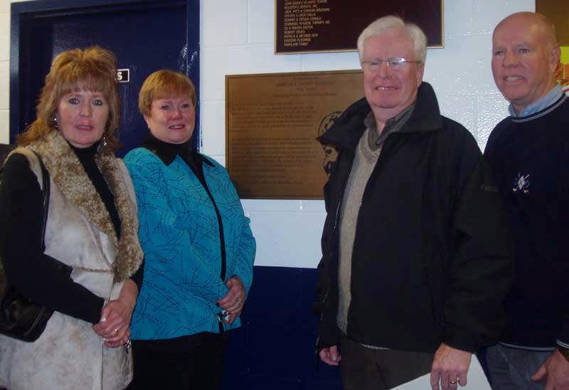 The Buckleys with mounted plaque Organizers of Mort Buckley Day (l-r) Standing: Phil Marks,