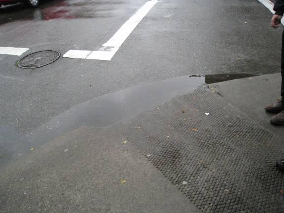 Best Practice - Drainage at To prevent standing water at the base of curb ramps: Place inlets upstream of ramps Widen the gutter pan and flatten at the