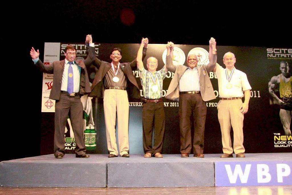 WBPF Gold Medal Awarded to Mr.M.Letchmenon, Mr. Peter Teo and Mr. Pang Nai Seng by Mr. Paul Chua Left to Right Prof. Dr. Rano Izhar (Organising Chaiman), Mr. M. Letchmenon (Ex-President SBBF), Mr.