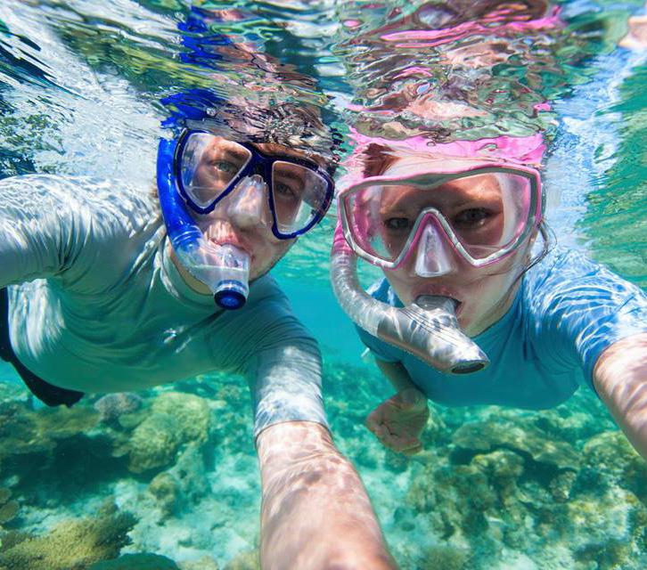 Snorkeling offers views of all kinds of rays, turtles and rivers of wrasse swimming along stunning coral structures.