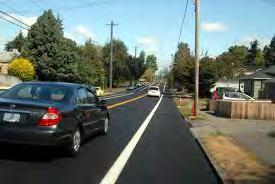 Narrow Travel Lanes are created by using pavement markings, raised pavement markers or vertical panels, as shown in Figure 2.