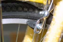 The front brake rubbers which rub against the wheel rim to provide you with stopping power need to be adjusted into the correct position as shown in