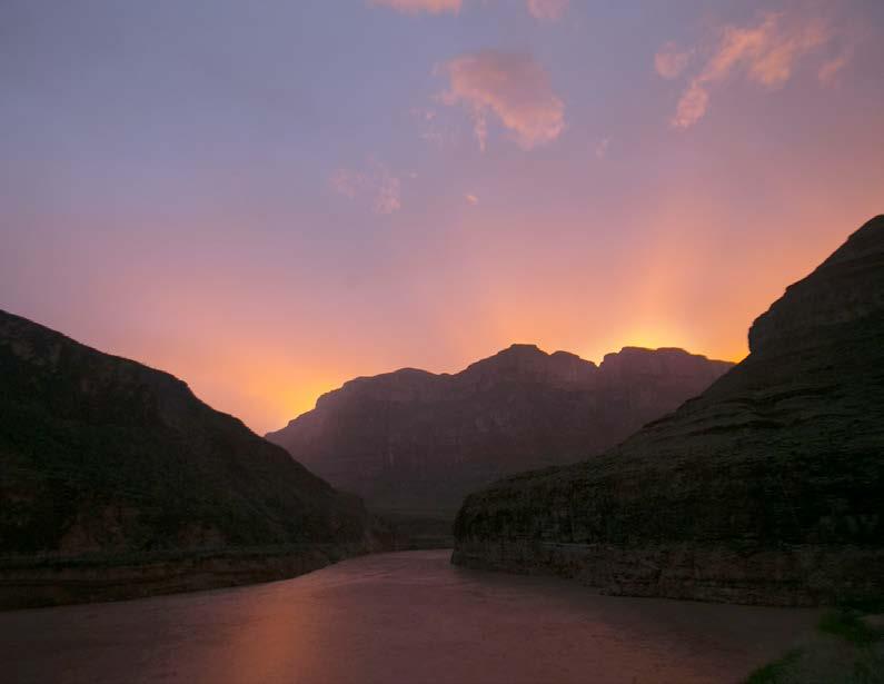 Punch Here The sun sets over the Colorado River in the western part of