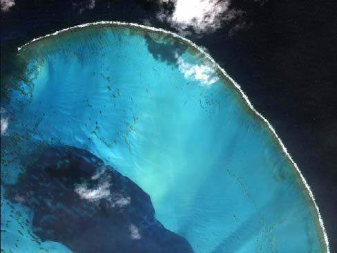 Atoll Atolls are rings of reef, often encircling an island having a shallow, sandy, sheltered lagoon in the middle Atolls grow on top of the submarine mountains which are