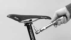 Release both seat clamp bolts at the top of the seat post. Turn the bolts two to three turns antclockwse at the most, otherwse the whole assembly can come apart.