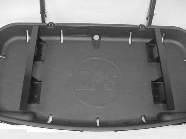 1 Place the Main Support Brackets on top of Cargo Tray with the mounting holes toward the center of the tray.