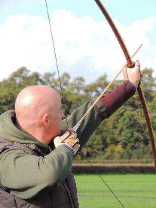 And on the subject of indoor archery I was asked to include this photo of one of our well known club members by other archers concerned for his welfare/ sanity under the following caption: Longbow