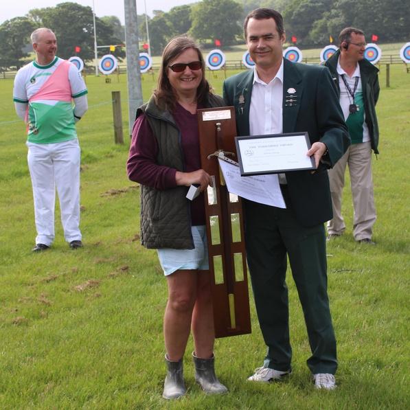 Val Henty receives the Yorkshire word The Yorkshire word for services to archery was presented to Valerie Henty at the YAA Championships on unday the 5th of June 06 by YAA President Andrew Neal.
