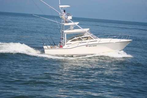 www.wahooswatersports.com Book here!! B#3 Boat 35 Carolina Max 6 Pax -Fully bilingual native captain with 17 years of experience in the area. -35fet s Carolina classic.