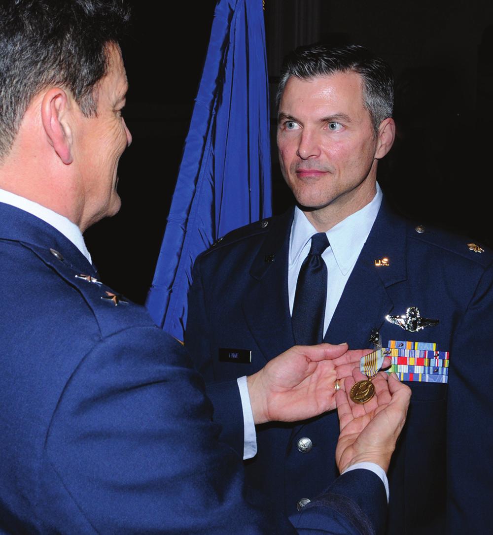 Texas, presents the Airman s Medal to Lt Col Richard