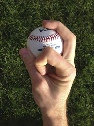 Changeup Notice this pitch is thrown with the middle and ring fingers. Bring pinky up on ball for better fade. Circle with the index finger. Feel the ball come out of this side.
