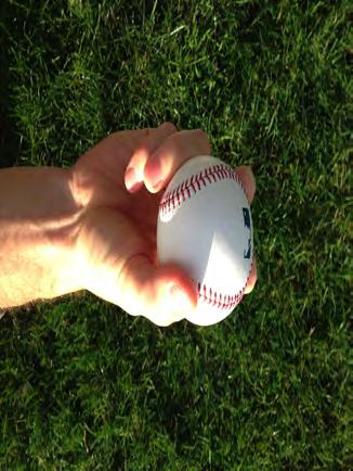 Knuckleball Two finger grip. Also try this with three fingers. Dig your nails into the ball, not your knuckles. Notice the thumb placement.