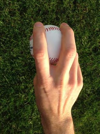 4 Seam Fastball Feel the seam across the finger tips. Most of the finger should be resting on the ball. Thumb should be between finger tips.