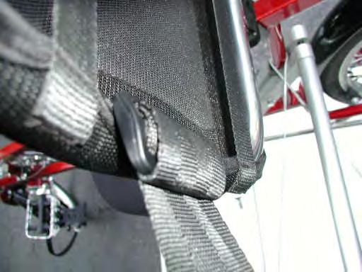 Unclip or open the lower two seat back mounting clips from the EZ-1 koolback seat.