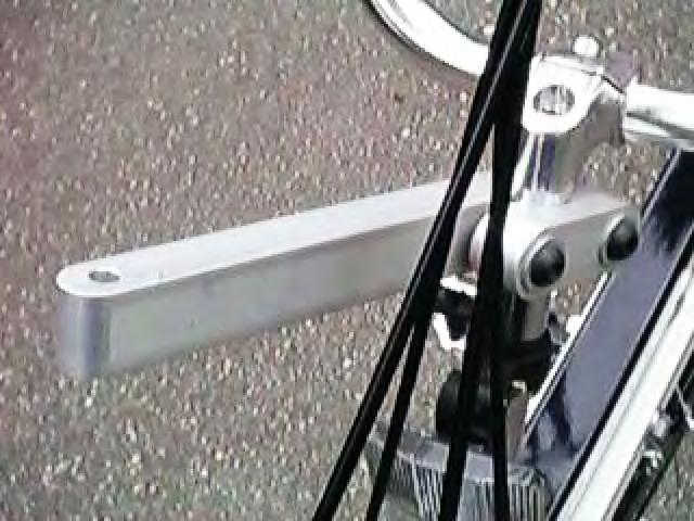The labels on the steering lever should face outboard - right side of right bike and left side of left bike (shown).