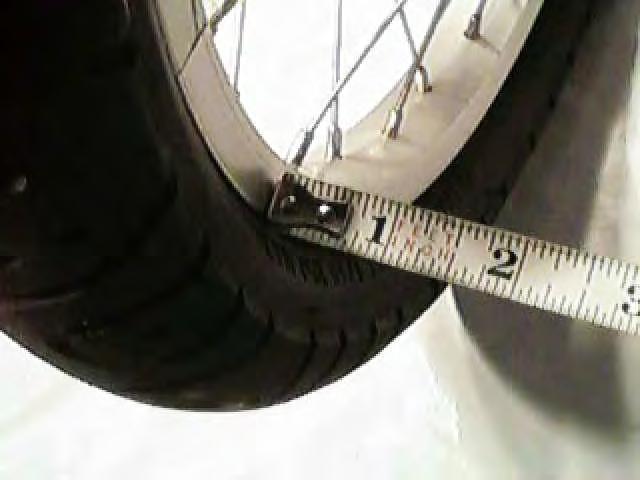 E Z - 1 Q U A D R I B E N T A S S E M B L Y A N D U S E R G U I D E FRONT END WHEEL ALIGNMENT 15) Check front-end wheel alignment by measuring the distance between the front rims of the two bikes as